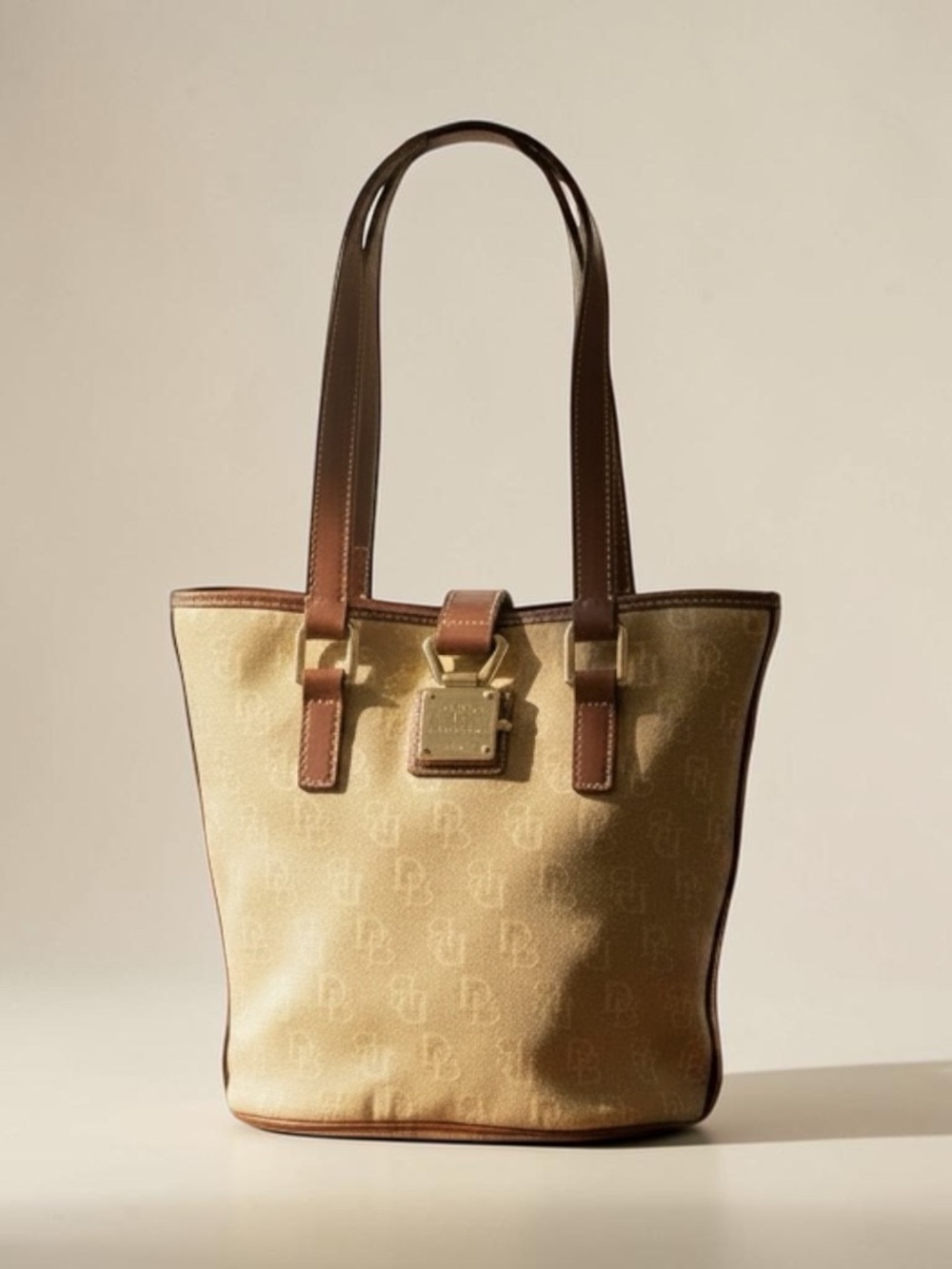 Dooney and Bourke Beige Canvas Bucket Tote with Brown Leather Trim - Picture 8 of 8